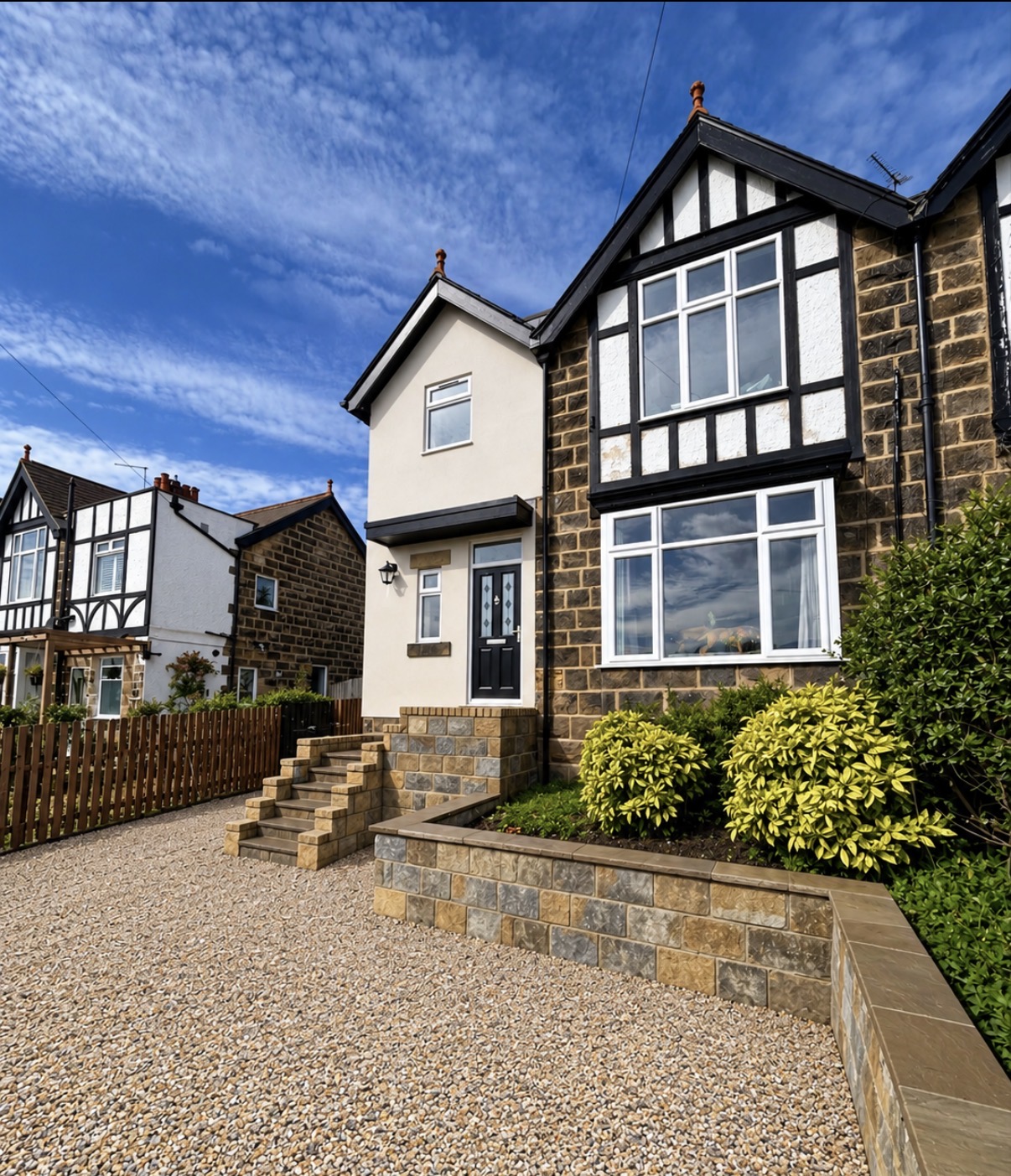 Double extension complete with stone steps and retaining wall